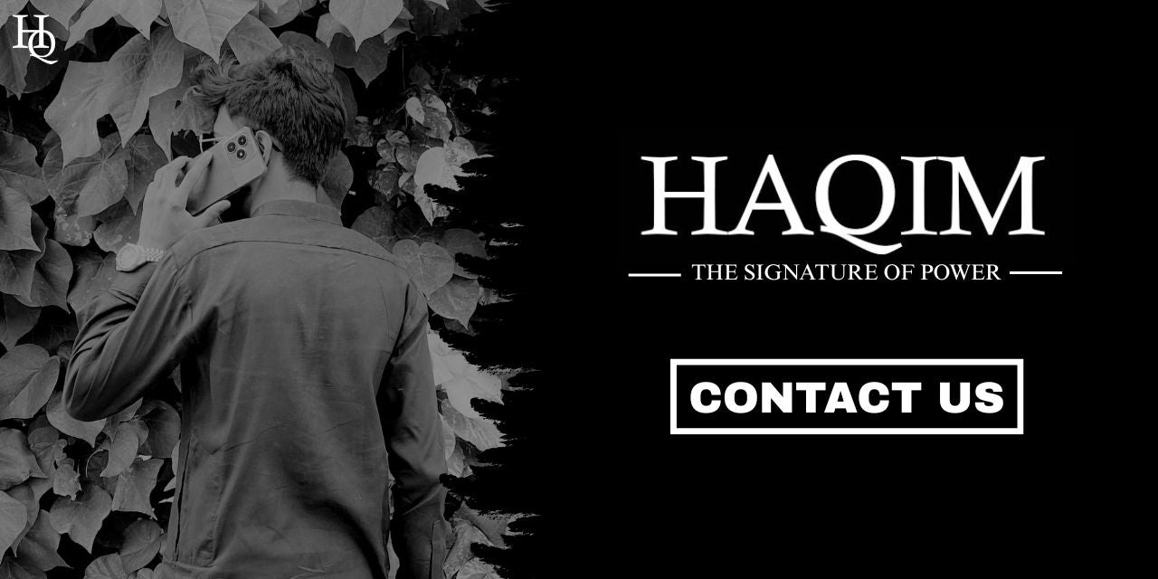 Man leaning against a leafy wall with 'HAQIM' branding and contact information.