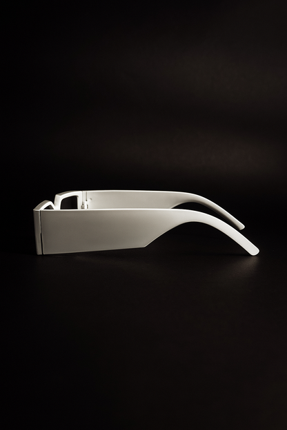 White sunglasses on a black background